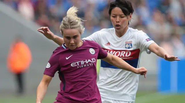 Isobel Christiansen of Manchester City Women is challenged by Saki Kumagai of Olympique Lyonnais