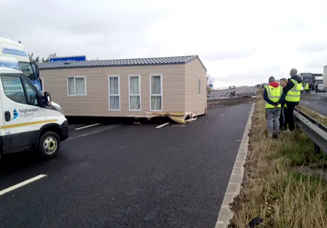 Static caravan in the middle of the motorway