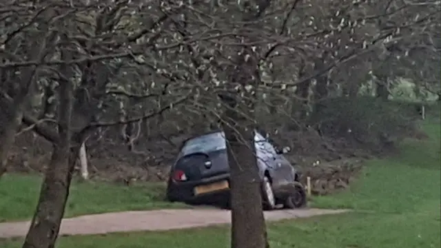 Car stuick on golf course