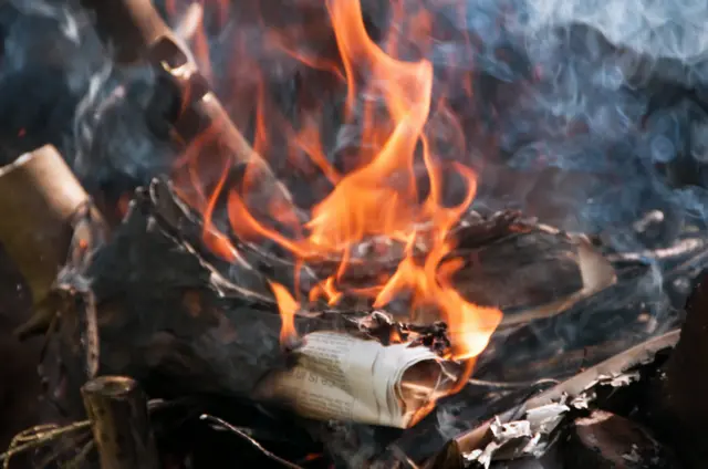 Paper being burnt