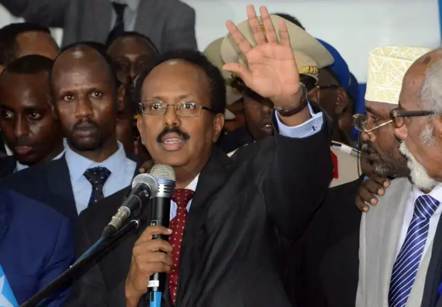 Mohamed Abdullahi Farmajo gestures as he makes an address on February 8, 2017, in Mogadishu