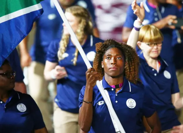 Caster Semenya, flag bearer of South Africa arrives with the South Africa team during the Opening Ceremony for the Gold Coast 2018 Commonwealth Games at Carrara Stadium on April 4, 2018 on the Gold Coast, Australia.
