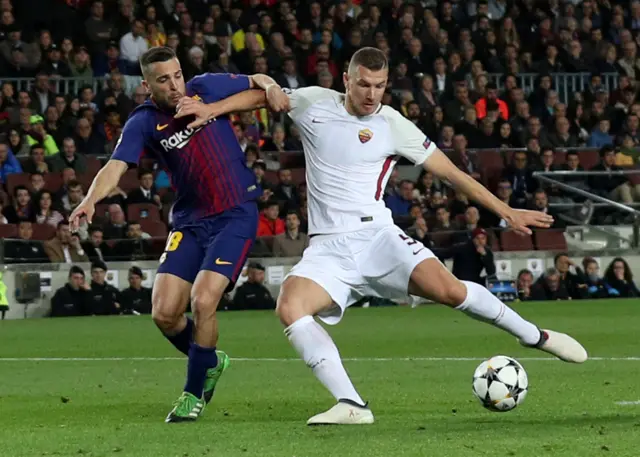 Edin Dzeko scores