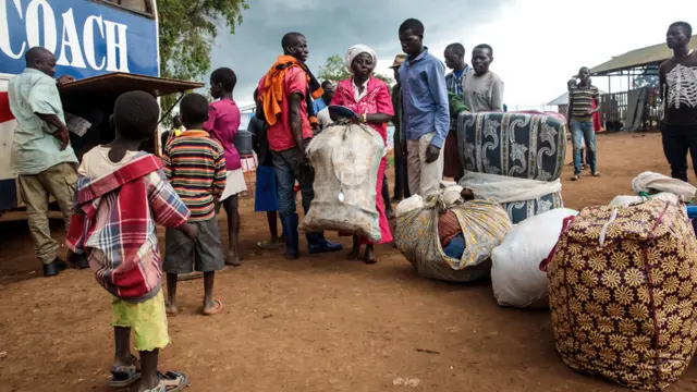 Refugees from the Democratic Republic of Congo arrive by bus at the Kagoma reception centre on April 3, 2018 in Kyangwali, Uganda.