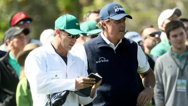 Phil Mickelson and Caddie