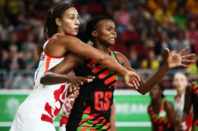 Geva Mentor England defends against Mwai Kumwenda of Malawi during the Netball Preliminary Round Pool B match between Malawi and England on day two of the Gold Coast 2018 Commonwealth Games at Gold Coast Convention and Exhibition Centre on April 6, 2018 on the Gold Coast, Australia.