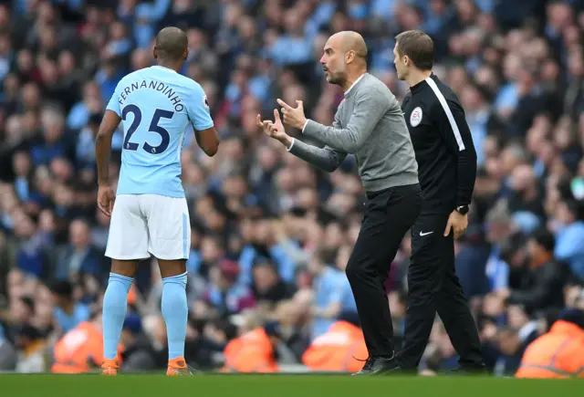 Pep Guardiola and Fernandinho