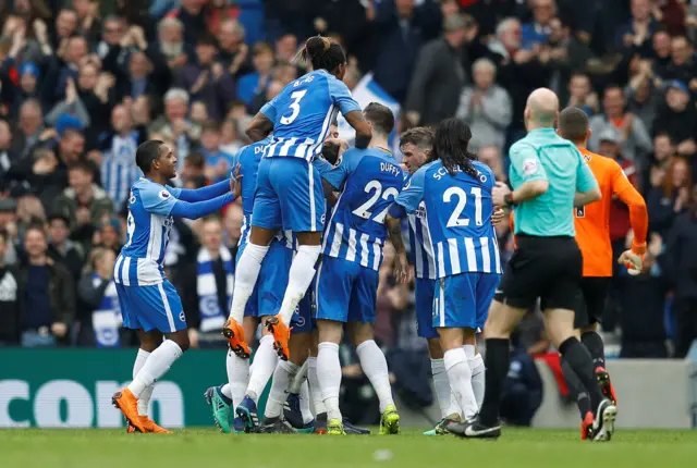 Brighton players celebrate