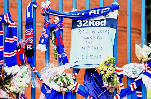 Tributes are laid outside Ibrox for former Rangers player Ray Wilkins