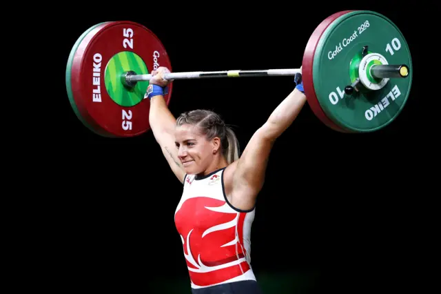 England's Emily Godley wins Gold in Women's 75kg weightlifting