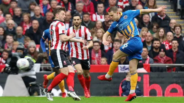 Bryn Morris hits the bar for Shrewsbury