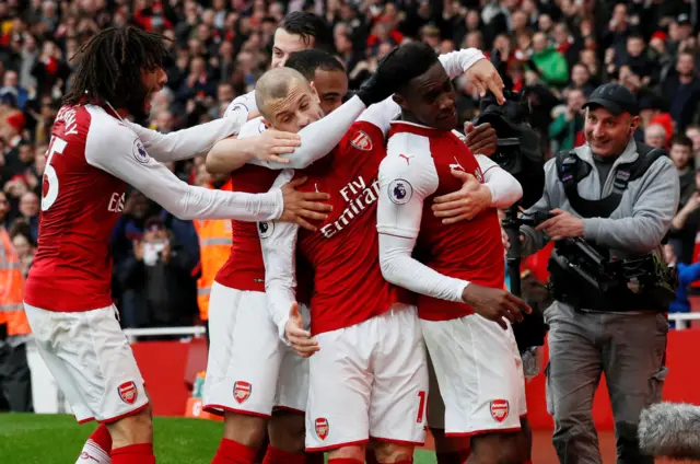 Arsenal celebrating Welbecks goal