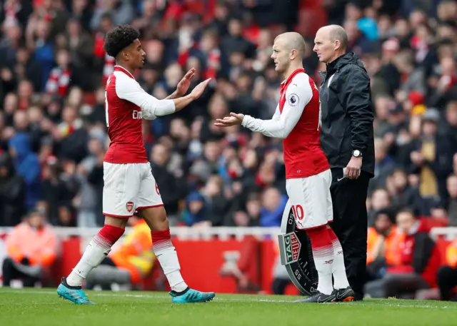 Reiss Nelson comes off for Jack Wilshere