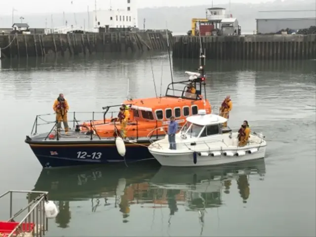 Pleasure boat, Jess, alongside RNLI lifeboat