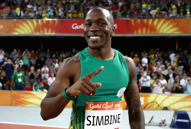 Akani Simbine of South Africa celebrates winning gold in the Men's 100 metres final during the Athletics on day five of the Gold Coast 2018 Commonwealth Games at Carrara Stadium on April 9, 2018 on the Gold Coast, Australia.