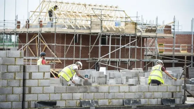 Builders on a building site