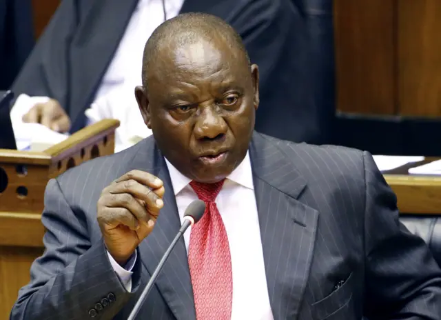 Newly appointed South African President Cyril Ramaphosa gestures as he delivers a speech after being elected by the Members of Parliament during his swearing in ceremony at the Parliament in Cape Town, on February 15, 2018.