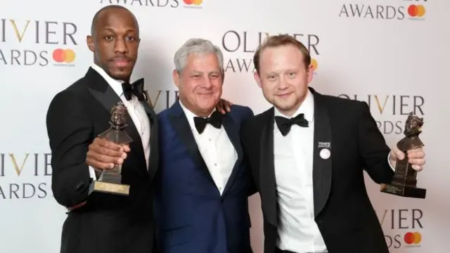 Giles Terera, Sir Cameron Mackintosh and co-star Michael Jibson, winner of the best actor in a supporting role