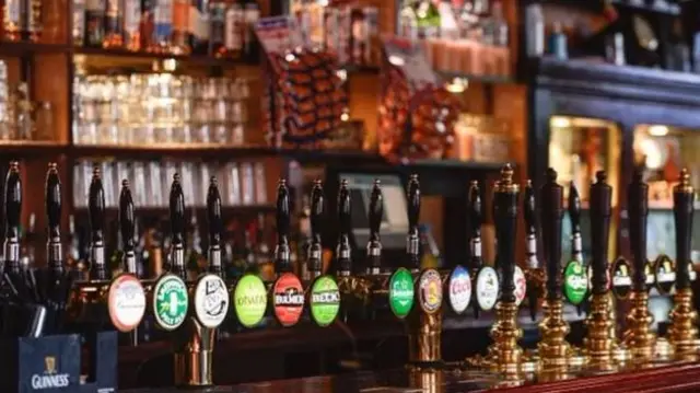 Beer taps on bar