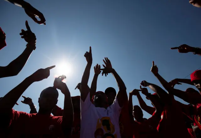 South African Communist party members join union members in a Workers Day march in Durban, South Africa, May 1, 2018.