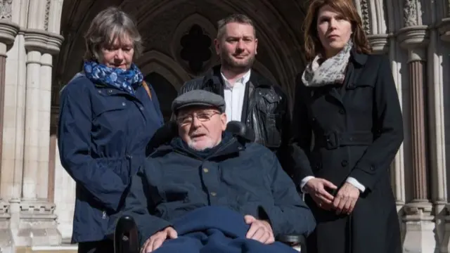 Noel Conway, 67, who suffers from motor neurone disease, outside The Royal Courts of Justice in London last year with family and supporters