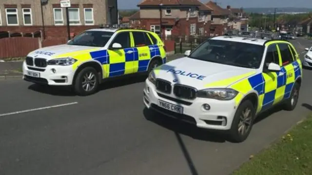 Police cars at scene