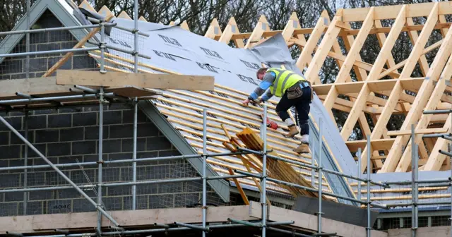 A man building a house