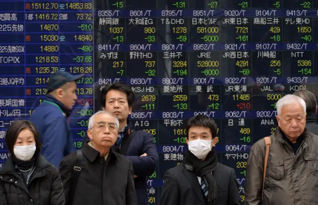 Nikkei 225 in Japan - a board showing stocks