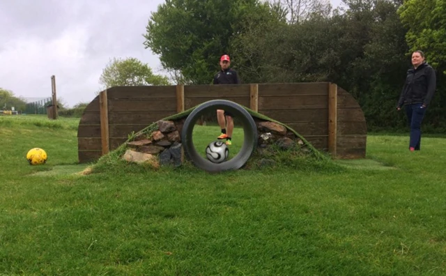 two people playing football golf