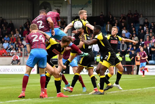 Ivan Toney heads a corner