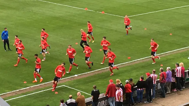 Lincoln City players warming up