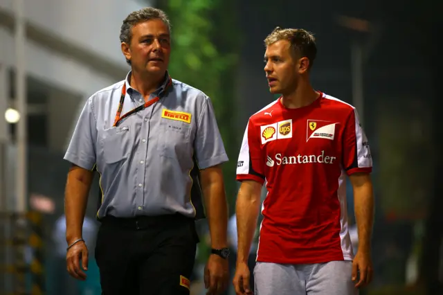 Mario Isola and Sebastian Vettel