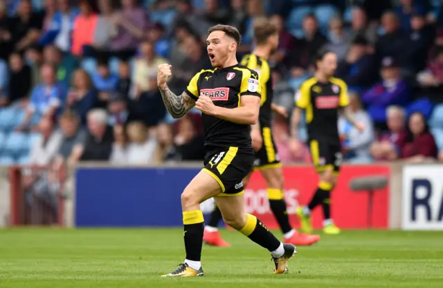 Jon Taylor celebrates his goal