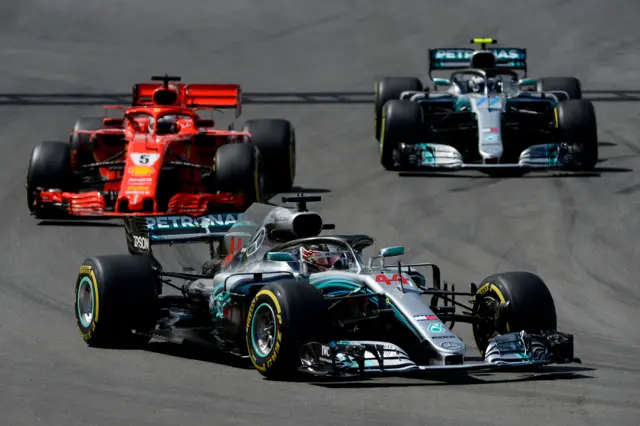 Mercedes British driver Lewis Hamilton, Ferrari's German driver Sebastian Vettel and Mercedes Finnish driver Valtteri Bottas