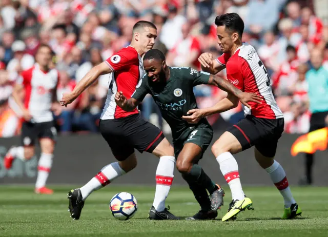 Maya Yoshida and Raheem Sterling