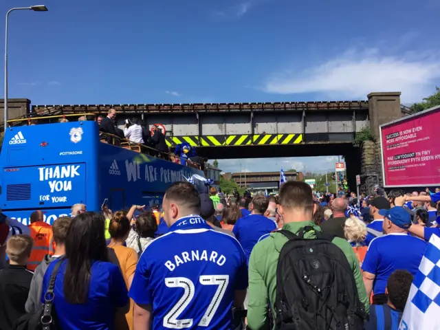 fans following bus