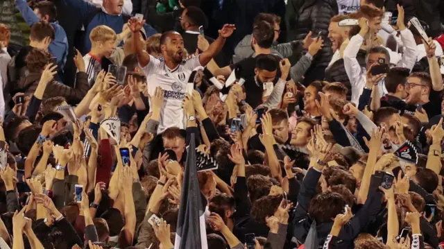 Denis Odoi among Fulham fans