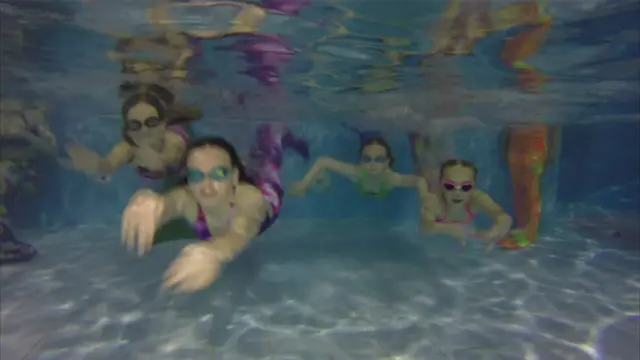 Children taking part in mermaiding