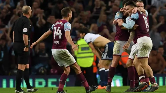 Aston Villa celebrate at the full time whistle