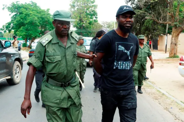 Chama Fumba, known as as Pilato, during a march to the parliament building in Lusaka on September 29, 2017 to demonstrate against what protesters say is a corrupt purchase of 42 fire engines by the government.