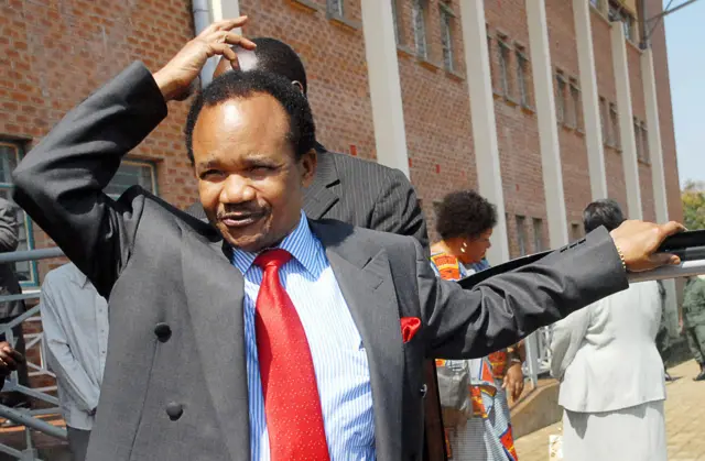 Chiluba gestures as he leaves the Lusaka Magistrates Court on Febrauary 15, 2008