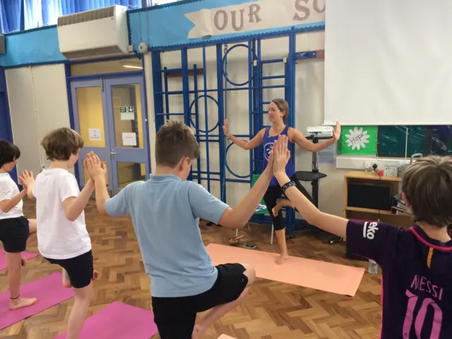 children doing yoga