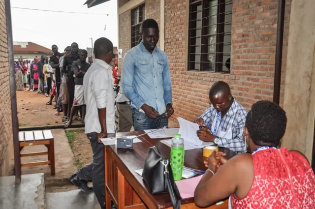 People start voting for the referendum on a controversial constitutional reform at a polling station in Bujumbra, Burundi, on May 17, 2018