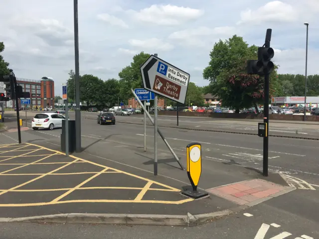 Damaged road sign