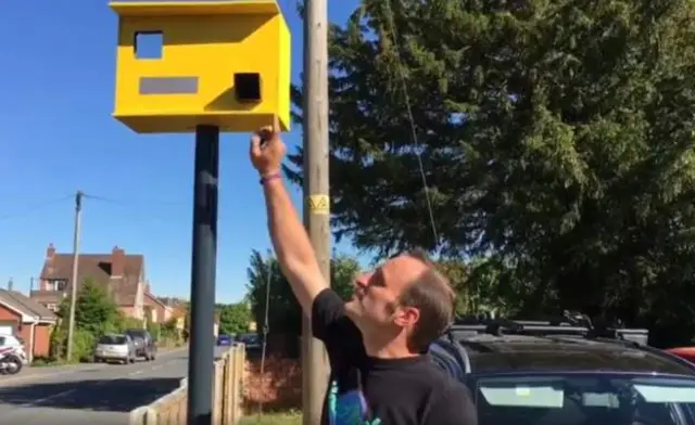 James Dyke with his fake speed camera