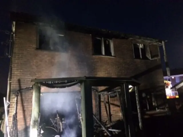 Remains of a burnt out house