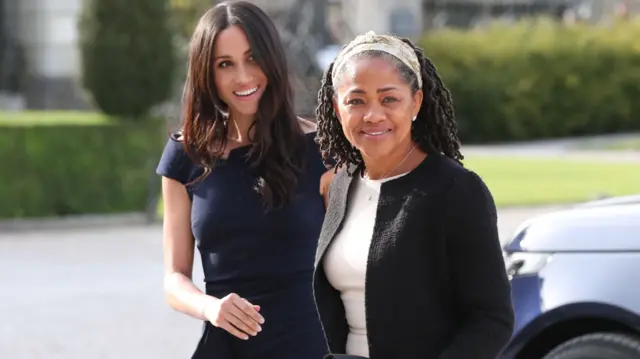 Meghan Markle (L) arrives with her mother Doria Ragland at Cliveden House hotel