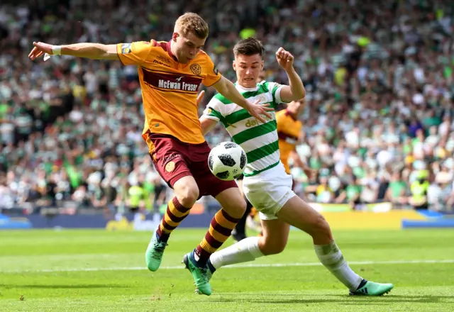 Kieran Tierney and Chris Cadden tussle