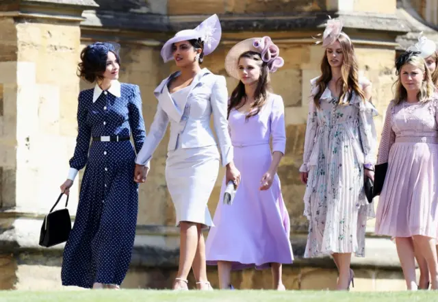 Abigail Spencer and Priyanka Chopra, second from left, arrive at the wedding