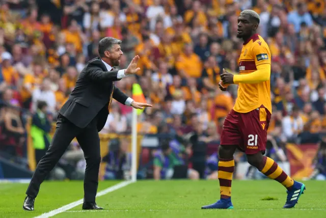 Motherwell manager Stephen Robinson and defender Cedric Kipre